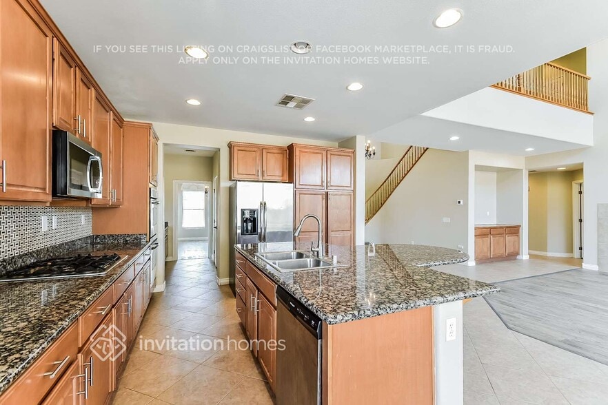 Building Photo - 7008 Puetollano Dr