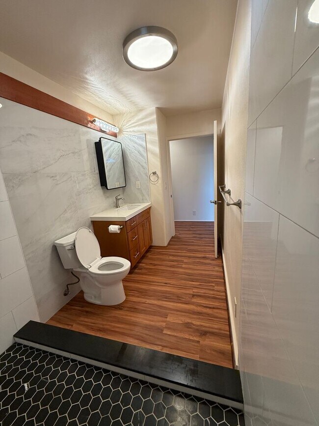 Building Photo - Upper Kalaheo, fully renovated three-bedroom two bathroom home.