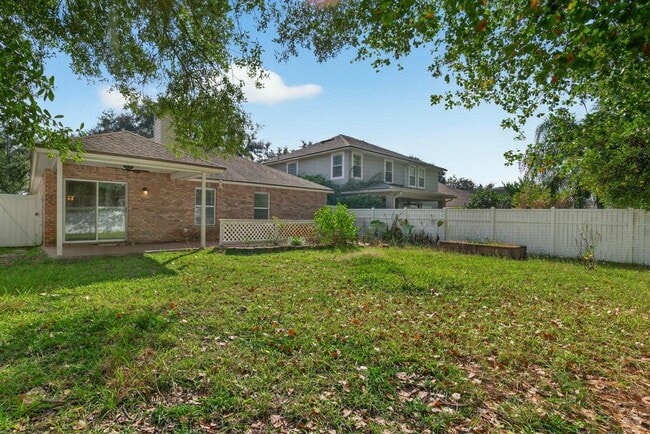 Building Photo - 1727 Canopy Oaks Dr