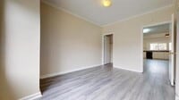 Building Photo - Top-Floor 3BR with Renovated Kitchen Acros...