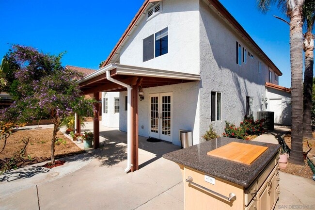 Building Photo - 4 Bed/2.5 Bath Home in Poway. Open Floor Plan, AC/Heat, W/D + Laundry Room and 3 Car Garage!
