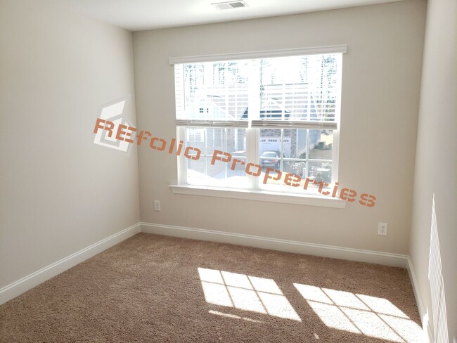 Building Photo - Charming 4 Bedroom, 2.5 Bath, 2-Car Garage...
