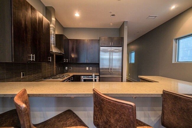 Building Photo - Luxury Penthouse Condo Downtown with Private Patio & Amazing Views Available Now!