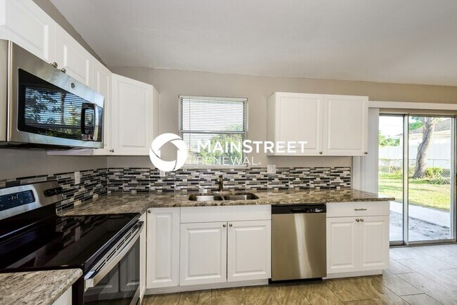 Building Photo - 3 Bedroom Pet-Friendly Home in CAPE CORAL,...