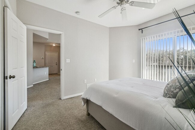 Building Photo - Elegant 1-Bedroom Condo with Lakeside Views in Resort-Style Community