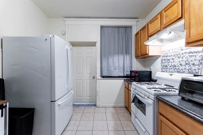 Building Photo - 6112 S St Lawrence Ave