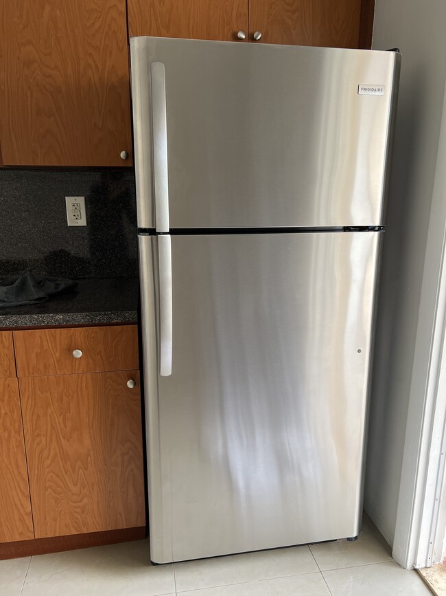 Stainless steel refrigerator - 5010 SW 26th Ave