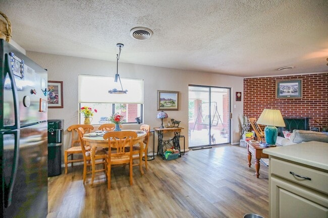 Building Photo - Three Bedroom Home with Plush Backyard