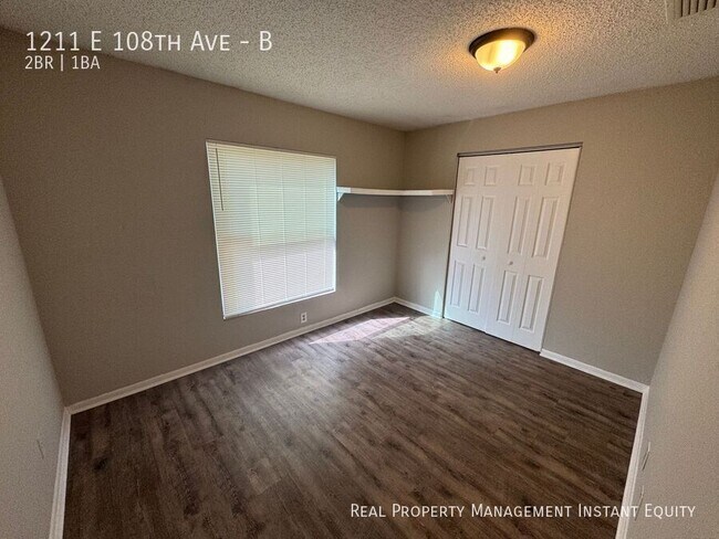 Building Photo - 1211 E 108th Ave