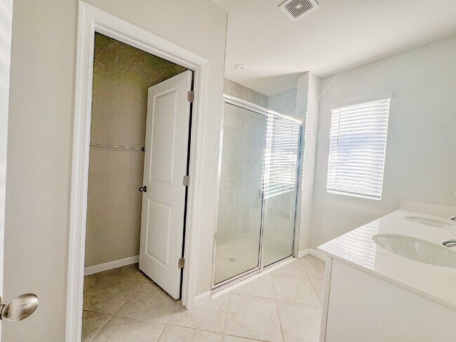 Building Photo - Open Floor Plan! Nice corner lakefront home!  Community pool, playground and walking trails.