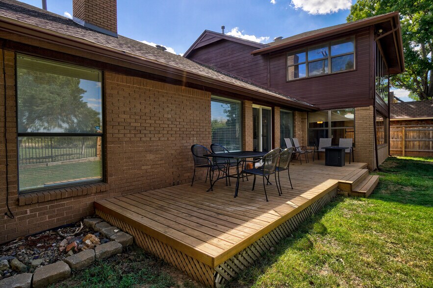 Dine outside or hang out by the fire pit. - 3905 NW 70th St