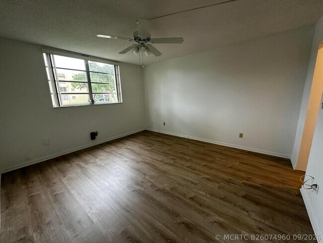 Building Photo - 6091 NW 61st Ave
