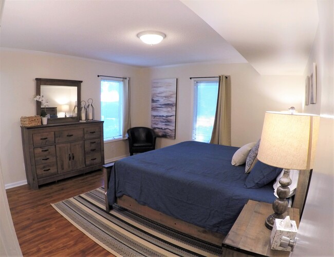 Master bedroom with room darkening curtains - 17 Racquet Club Rd