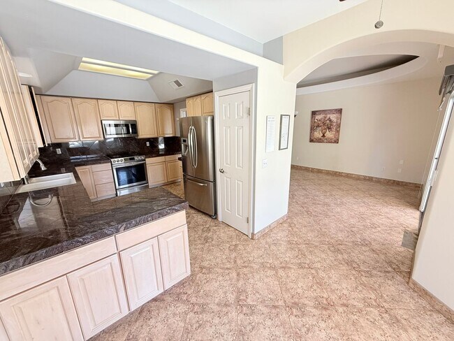 Building Photo - Spacious 4-Bedroom Home with Pool & Spa in...