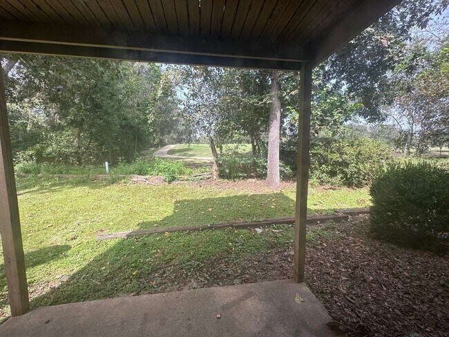 Building Photo - Downstairs unit NO CARPET ON GOLF COURSE!!!