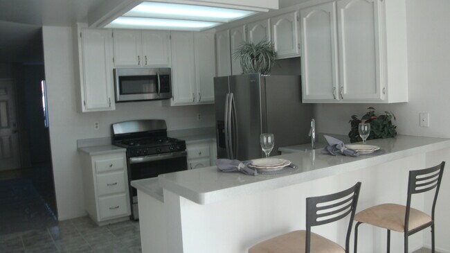 Kitchen w/ SS appliances - 41590 Maroon Town Rd