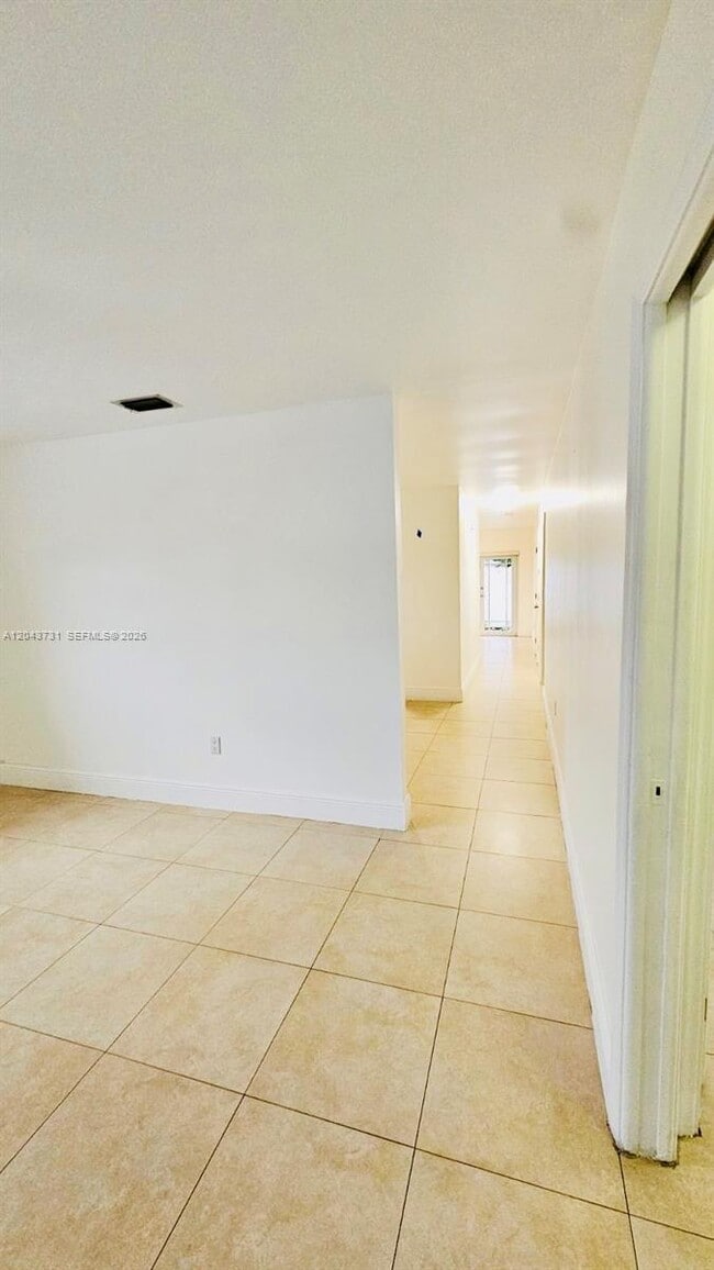 Building Photo - 3180 SW 25th Ter