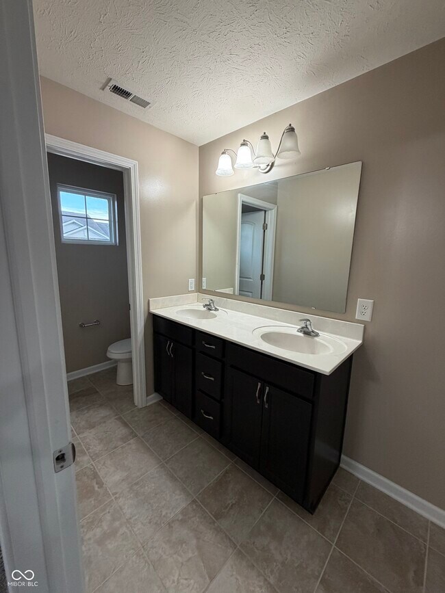 Building Photo - 9660 Angelica Dr