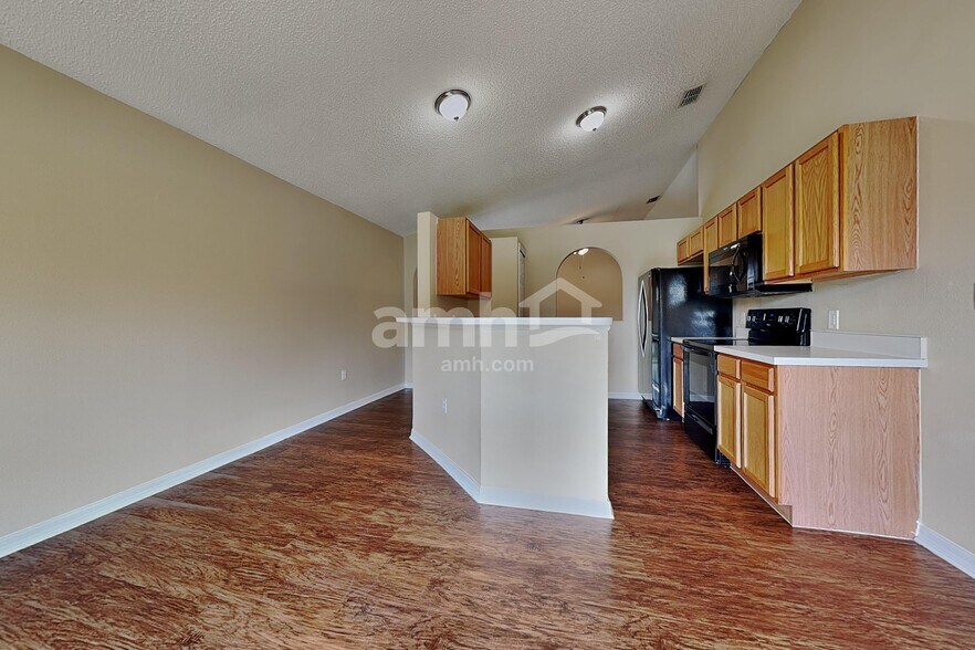 Building Photo - 6407 Tabogi Trl
