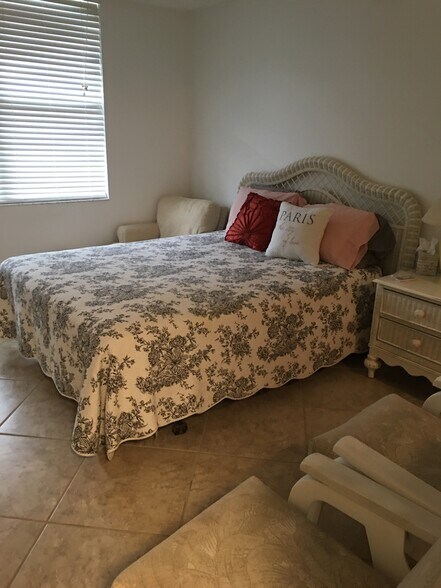 Guest Bedroom (muted) - 9650 S Ocean Dr