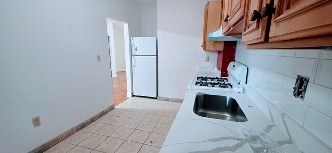 Building Photo - No Fee w Promo!  Spacious Apt on Brookline Border w Gas, Ht & HW ALL Included!  Near B & C lines!