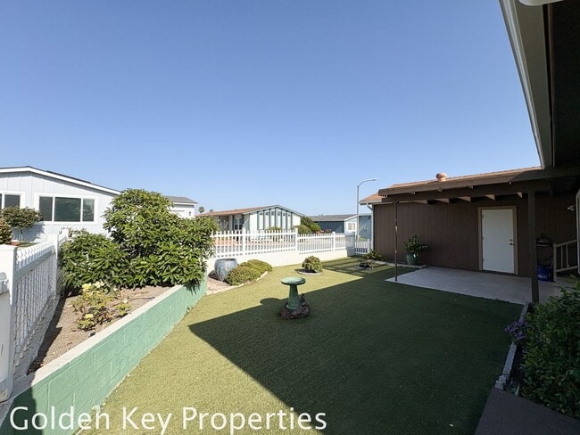 Building Photo - Welcome to the spacious single-level manuf...