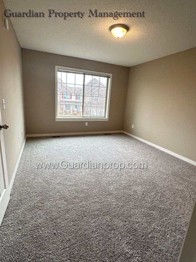 Building Photo - North Brooklyn Park Town Homes, Dedicated Office, 2 Car Garage, Washer/Dryer, Front Patio