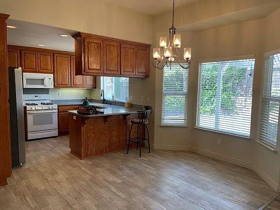 Building Photo - Freshly painted home with newer appliances. Quiet neighborhood near parks, shopping and schools.