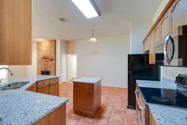 Building Photo - "Beautiful Single-Story Featuring an Office, Open-Concept Design, Dual Living Areas and a Large O...