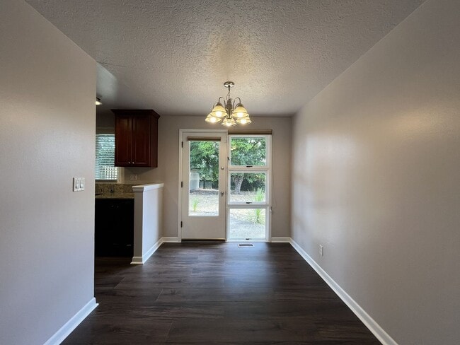 Building Photo - Charming Single-Level 3 Bedroom Home with Spacious Fenced Backyard, Landscaping Included & Great ...
