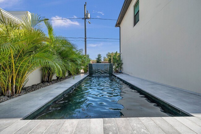 Building Photo - Luxury Living in Grand Central District: Exquisite Furnished Home with Pool