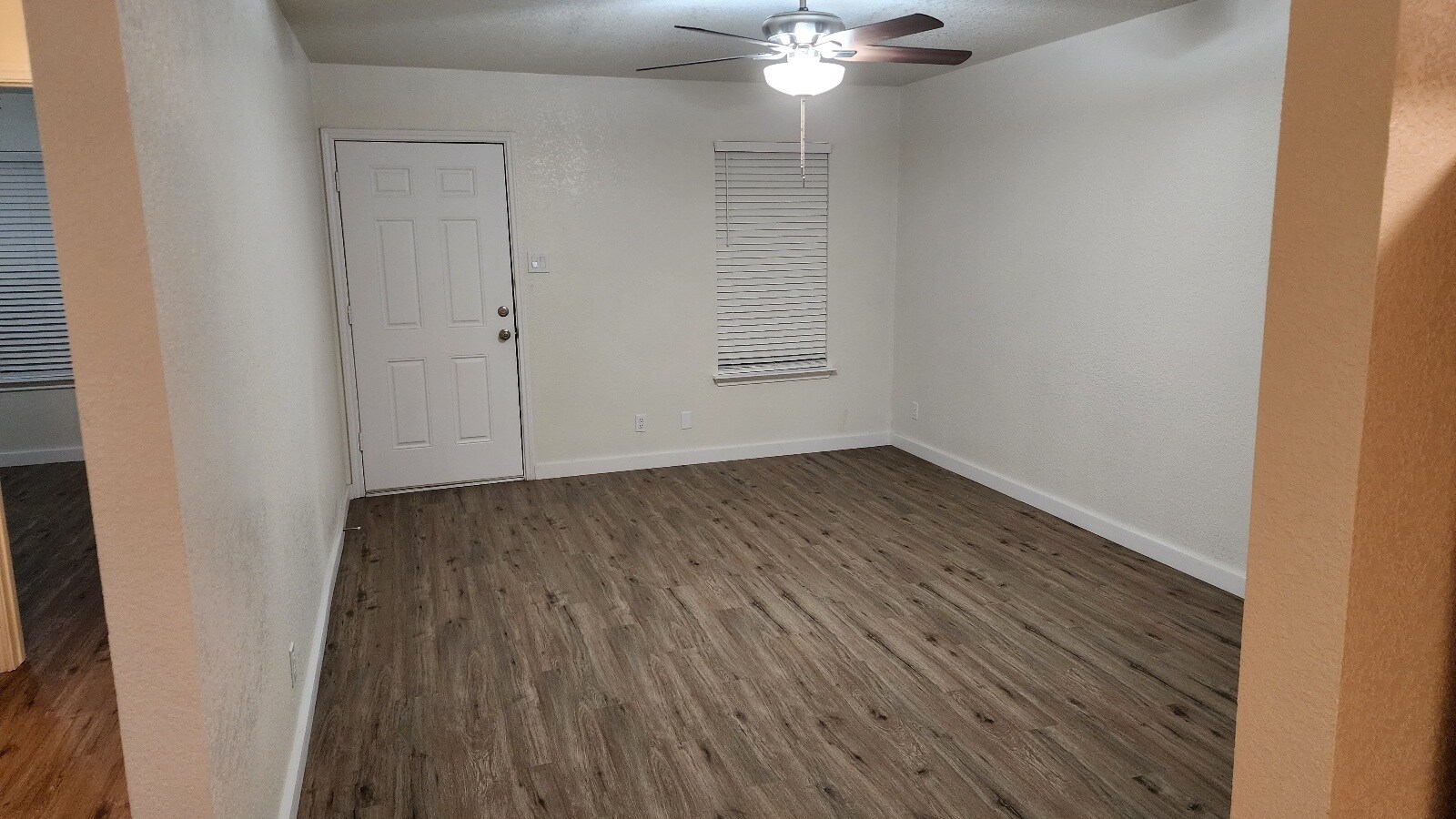 Living area is larger than the photo looks. New faux wood blinds on all the windows - 1110 Circle M Dr