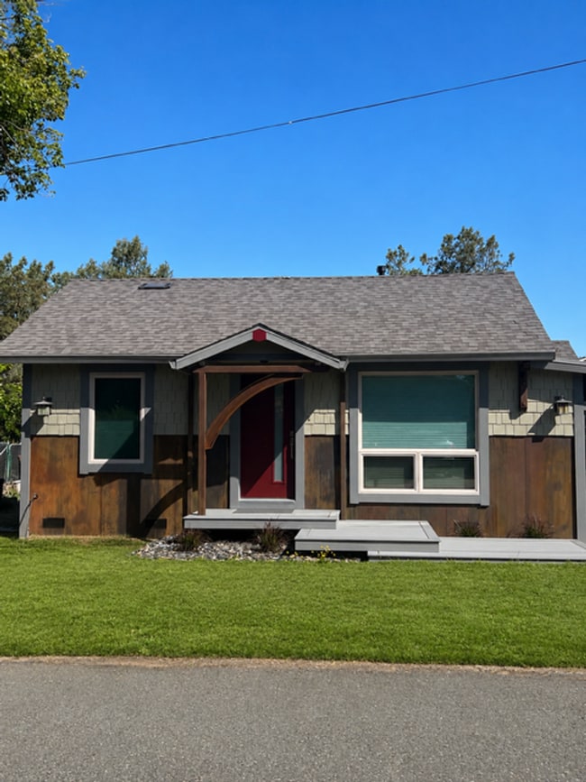 Building Photo - Artisan-Built Custom Cottage Retreat | Private Yard, Garage & EV Charging Ready