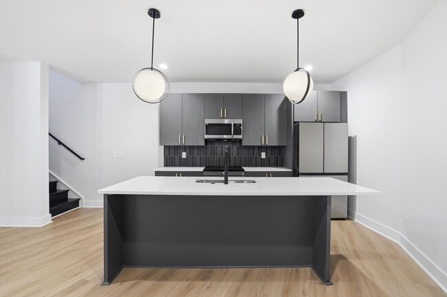 Building Photo - Bright, Open & Exceptionally Large—Your Ideal 2-Story Townhome