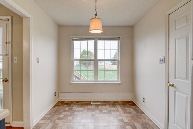 Building Photo - Amazing Home With Fireplace and Hardwood Flooring in Whitehall Subdivision