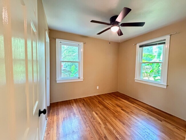 Building Photo - Historic Downtown Charm | Original Floors | Walk to Golf, Dining, Parks, & Concerts