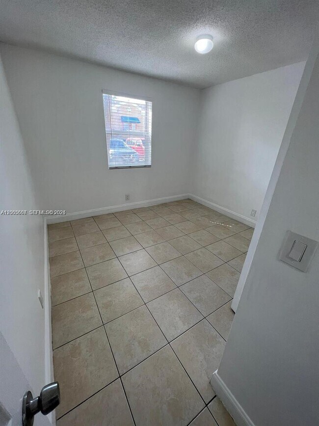 Building Photo - 2421 NW 56th Ave