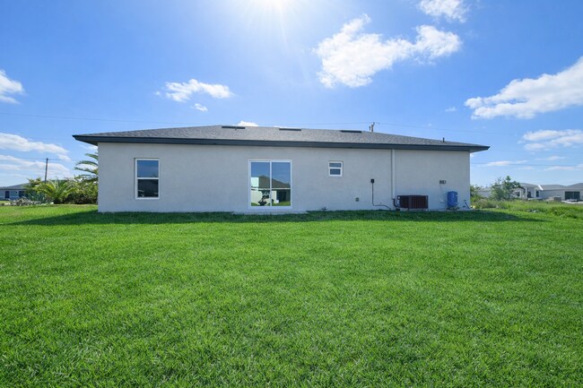 Building Photo - STUNNING NEW 3BR/2BA HOME WITH GARAGE -IN PRIME SW LEHIGH ACRES LOCATION