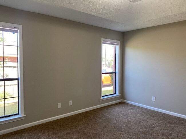 Building Photo - Charming 3-Bedroom Brick Home with Modern ...