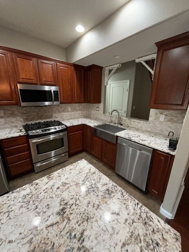 Building Photo - 10115 Avenida Vista Cerros NW