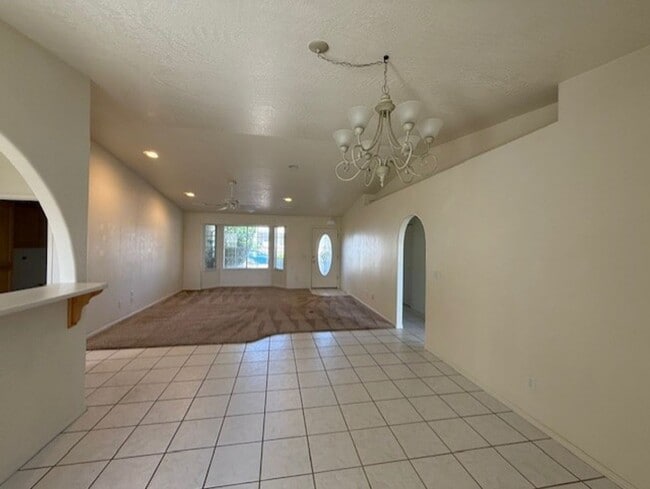 Building Photo - Occupied Do Not Disturb Tenant 3 Bedroom Plus Den & 2 Bath home Contact Property Pros Property Ma...