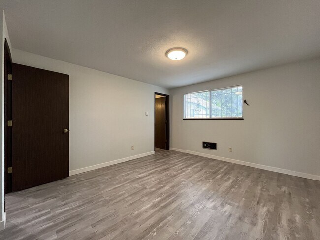 Building Photo - Single-Level 3-Bedroom Home with 2-Car Garage, Mini-Split AC, & Backyard Garden Space