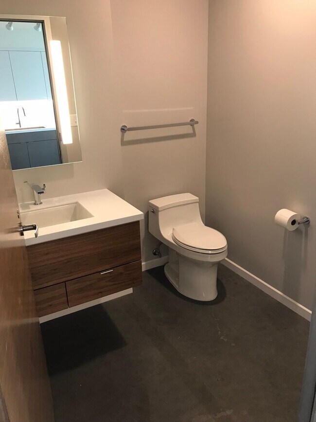 Building Photo - AVAILABLE AUGUST 2026 - Downtown Iowa City High-Rise Condo with Amazing Views