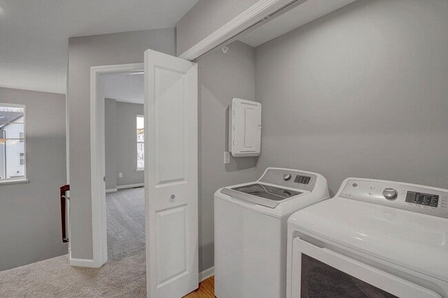 Building Photo - Available now is an almost new, charming 3...