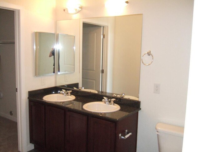 Building Photo - "Spacious 3-Bedroom Denver Condo with Cozy Fireplace & Modern Comforts!"