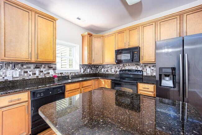 Building Photo - Liberty Square Townhouse with Upgrades!
