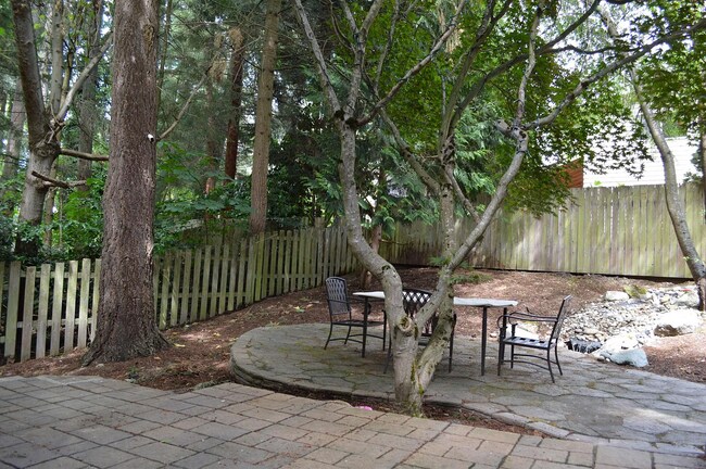 Backyard with small waterfall fountain - 6801 119th Pl SE