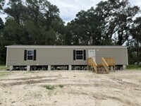 Building Photo - 139 SE Perfect Ct
