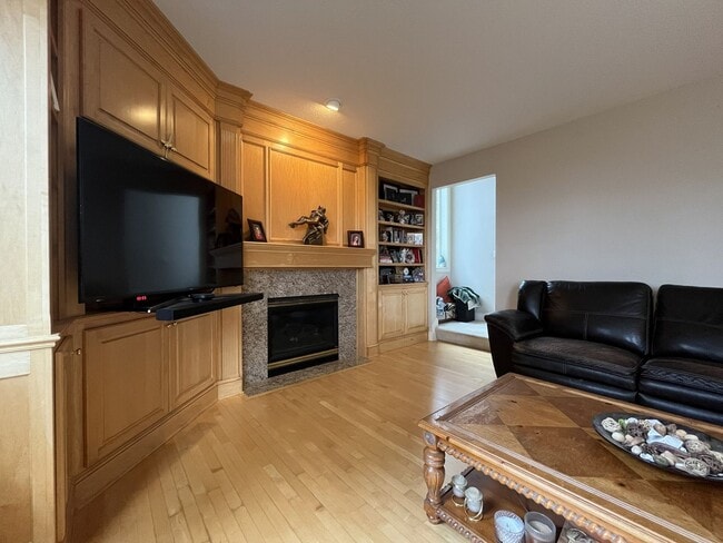 Building Photo - Executive-Style Northwest Heights Home with Forest Views and Refined Architectural Details