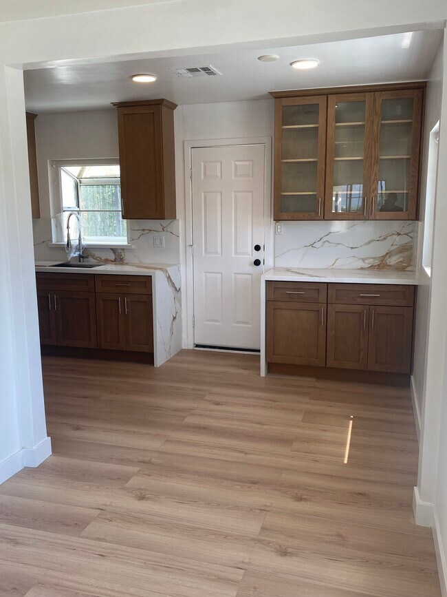 Dining room and kitchen New flooring and new Cabinets - 1437 Plumas St